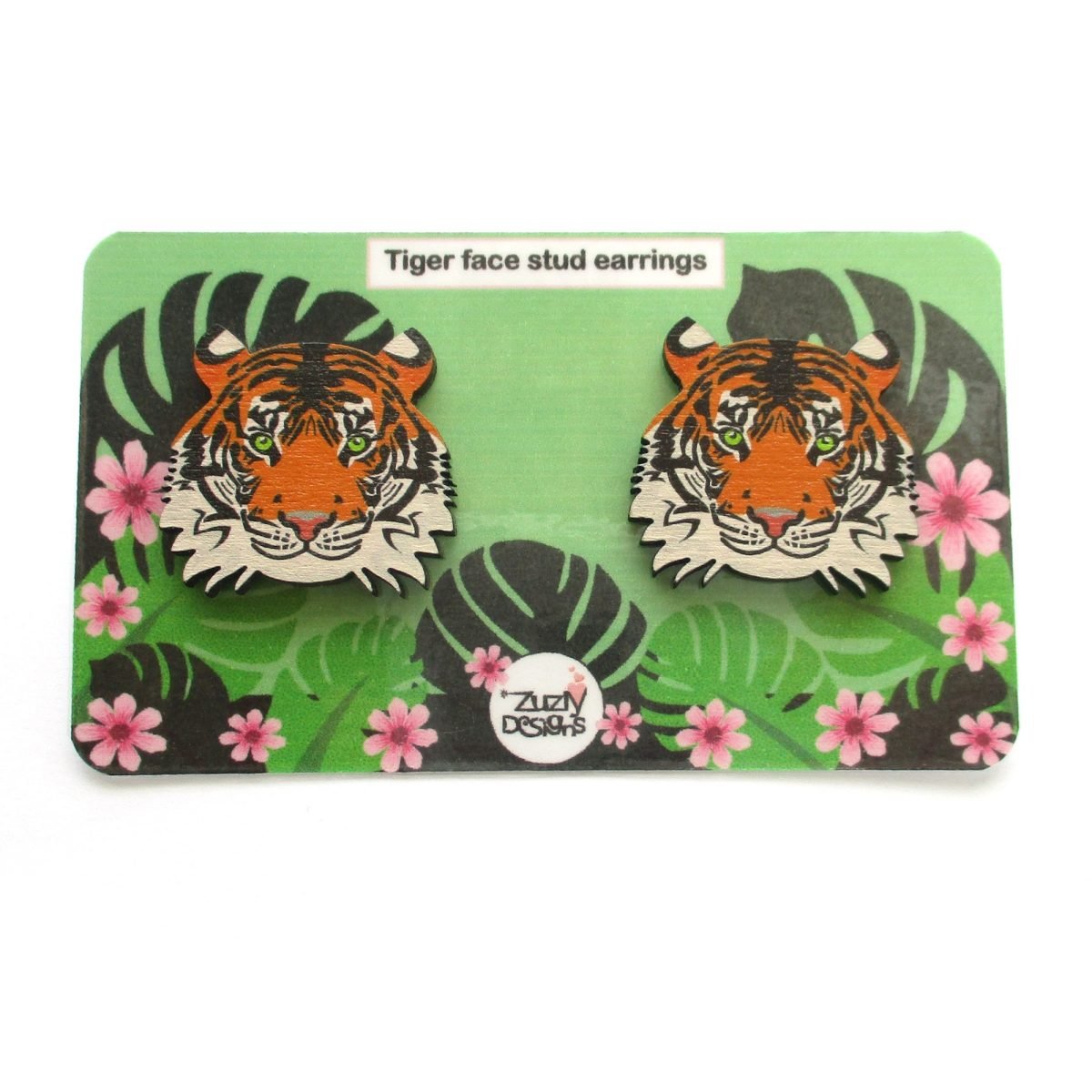 Tiger face stud earrings on packaging card